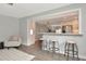 A cozy seating area with a breakfast bar perfect for casual dining at 111 Carlyle Dr, Palm Harbor, FL 34683