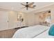 Comfortable main bedroom with ensuite sitting area, neutral colors, and ample space at 111 Carlyle Dr, Palm Harbor, FL 34683