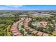 Aerial view showcases the neighborhood, amenities, and location of the home near community pool at 137 Silver Falls Dr, Apollo Beach, FL 33572
