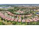 An aerial shot pointing out the house in a community with a pool and clubhouse at 137 Silver Falls Dr, Apollo Beach, FL 33572