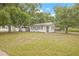 Charming exterior of a house with tidy landscaping, showcasing its welcoming facade at 1401 30Th N Ave, St Petersburg, FL 33704