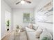 Bright living room with a soft gray sofa and trendy accents, creating a welcoming atmosphere at 1401 30Th N Ave, St Petersburg, FL 33704