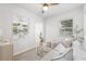 Serene living room featuring a stylish decor and a view to the greenery outside at 1401 30Th N Ave, St Petersburg, FL 33704