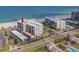 Beachfront condo complex with beautiful ocean views and parking. Red arrow points to available unit at 1430 Gulf Blvd # 707, Clearwater Beach, FL 33767