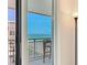 Balcony with an ocean view, including a table and chairs at 1430 Gulf Blvd # 707, Clearwater Beach, FL 33767