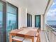 This condo balcony has a dining table and fantastic views at 1430 Gulf Blvd # 707, Clearwater Beach, FL 33767