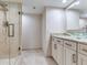 Bathroom boasts walk-in shower, granite countertops and modern vanity at 1430 Gulf Blvd # 707, Clearwater Beach, FL 33767