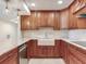 A kitchen featuring a granite countertop and stainless steel appliances at 1430 Gulf Blvd # 707, Clearwater Beach, FL 33767