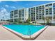 Large, sparkling pool and tropical landscaping at this beautiful beachfront condo complex with easy access to the beach at 1430 Gulf Blvd # 707, Clearwater Beach, FL 33767