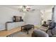 Bright and open living room featuring tile floors and a cozy seating arrangement at 14732 Morning Dr, Lutz, FL 33559