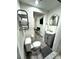 Contemporary bathroom featuring a new toilet, sink and vanity at 1515 E Hanna Ave, Tampa, FL 33610