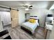 Cozy open area with barn door to bathroom at 1515 E Hanna Ave, Tampa, FL 33610