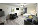 This studio features a bed, seating area, kitchenette, and modern finishes for comfortable living at 1515 E Hanna Ave, Tampa, FL 33610