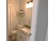 Updated bathroom with granite vanity, new fixtures and modern decor at 15916 Marshfield Dr, Tampa, FL 33624