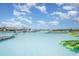 Enjoy the community's beautiful lagoon with kayaks, slides, and beach lounge areas at 16624 Maude Dr, Wimauma, FL 33598