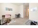 Bright office space with neutral walls and carpeting, desk, and ample natural light at 16624 Maude Dr, Wimauma, FL 33598
