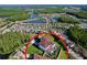 Home with pool, verdant lawn, and community views at 1947 Marshberry Ct, Trinity, FL 34655