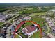 Home with verdant lawn, pool, and community views at 1947 Marshberry Ct, Trinity, FL 34655