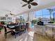 Spacious screened lanai with outdoor dining, kitchen, and views of the pool, ideal for entertaining at 1947 Marshberry Ct, Trinity, FL 34655