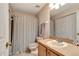 Simple bathroom with tub/shower combo, single vanity and medicine cabinet mirror at 213 Draw Bridge Ln, Valrico, FL 33594