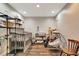 Inviting Bedroom with crib, changing table, baby swing, and charming decor at 213 Draw Bridge Ln, Valrico, FL 33594