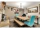 Stylish dining room featuring a wooden table with seating for Gathering and guests at 213 Draw Bridge Ln, Valrico, FL 33594