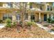 Charming townhome exterior featuring well-maintained landscaping and inviting curb appeal at 213 Draw Bridge Ln, Valrico, FL 33594