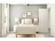 Relaxing bedroom featuring a bed with nightstands, carpeted floor, natural light, and neutral paint at 22363 Nebula Way, Land O Lakes, FL 34637
