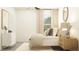 Relaxing bedroom showcasing a plush bed with decorative pillows, light-colored walls, and a serene ambiance at 22363 Nebula Way, Land O Lakes, FL 34637