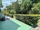 The private backyard offers lush landscaping, enhancing the sense of tranquility and privacy at 2391 Sumatran Way # 37, Clearwater, FL 33763