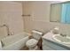 Bathroom features a single sink vanity and a standard sized bath tub at 2391 Sumatran Way # 37, Clearwater, FL 33763