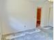 Bedroom leading to the bathroom with ceiling fan and open closet and floor project getting underway at 2391 Sumatran Way # 37, Clearwater, FL 33763
