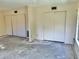 Bedrooms featuring large closets, two windows, and a blank canvas ready for personalization and design at 2391 Sumatran Way # 37, Clearwater, FL 33763