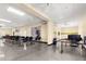 Bright meeting room furnished with tables, chairs, and multimedia equipment at 2391 Sumatran Way # 37, Clearwater, FL 33763