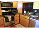 Efficient kitchen featuring stainless steel appliances and sleek countertops for a modern aesthetic at 2737 Enterprise E Rd # 192, Clearwater, FL 33759