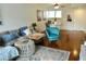 Inviting living room with contemporary furnishings, lots of natural light and hardwood floors at 2737 Enterprise E Rd # 192, Clearwater, FL 33759