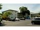 Ample parking available in this community, showcasing multiple vehicles and building facade at 2737 Enterprise E Rd # 192, Clearwater, FL 33759