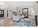 Bright living room with stylish decor, wood floors, and elegant furnishings at 2824 Paddock Dr, Palm Harbor, FL 34684