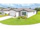 Beautiful single-story home with well-manicured lawn and landscaping for great curb appeal at 3082 Forrest Plum Ct, Zephyrhills, FL 33540