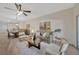 Spacious living room showing the open floor plan, which combines the dining area, and living room at 31814 Larkenheath Dr, Wesley Chapel, FL 33543