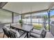 Covered patio with outdoor dining area and view of the fenced yard and surrounding neighborhood at 31814 Larkenheath Dr, Wesley Chapel, FL 33543