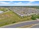 New townhome development featuring attached garages and manicured landscaping with proximity to highways and ponds at 3216 Bryant Park Dr, New Port Richey, FL 34655