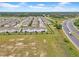 Modern townhomes offer stylish living with well-kept landscaping near roads, integrating convenience and beauty at 3216 Bryant Park Dr, New Port Richey, FL 34655