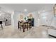 Bright dining area featuring a wooden table with seating and modern decor for a cozy, inviting atmosphere at 3216 Bryant Park Dr, New Port Richey, FL 34655