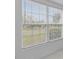 Window providing views of outside scenery and filling the room with natural light at 326 Circle Dr, Palm Harbor, FL 34683