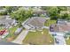Bird's eye view of a neatly kept home with boat parking, a fenced yard, and nearby houses at 344 Dartmouth Ave, Spring Hill, FL 34606