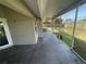 This is an expansive screened-in patio area that provides ample space for outdoor enjoyment at 3541 65Th Avenue E Cir, Sarasota, FL 34243