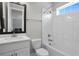 This bathroom has one sink, black hardware, and a shower with a bathtub at 3605 W Dale Ave, Tampa, FL 33609