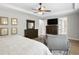 The primary bedroom boasts stylish decor with access to the primary bath and large dresser at 3605 W Dale Ave, Tampa, FL 33609