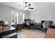 This office has multiple monitors, carpeted floors, and a ceiling fan at 3605 W Dale Ave, Tampa, FL 33609
